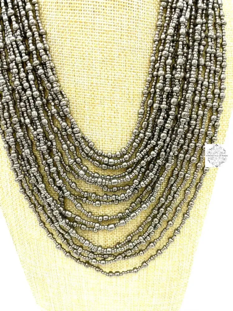 Hand beaded necklace from Ecuador | Multi-strand | Loop & Ball Closure | Eye-catching Design |