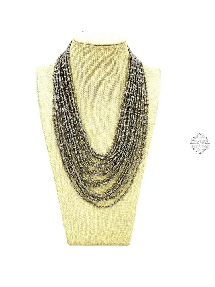 Hand beaded necklace from Ecuador | Multi-strand | Loop & Ball Closure | Eye-catching Design |