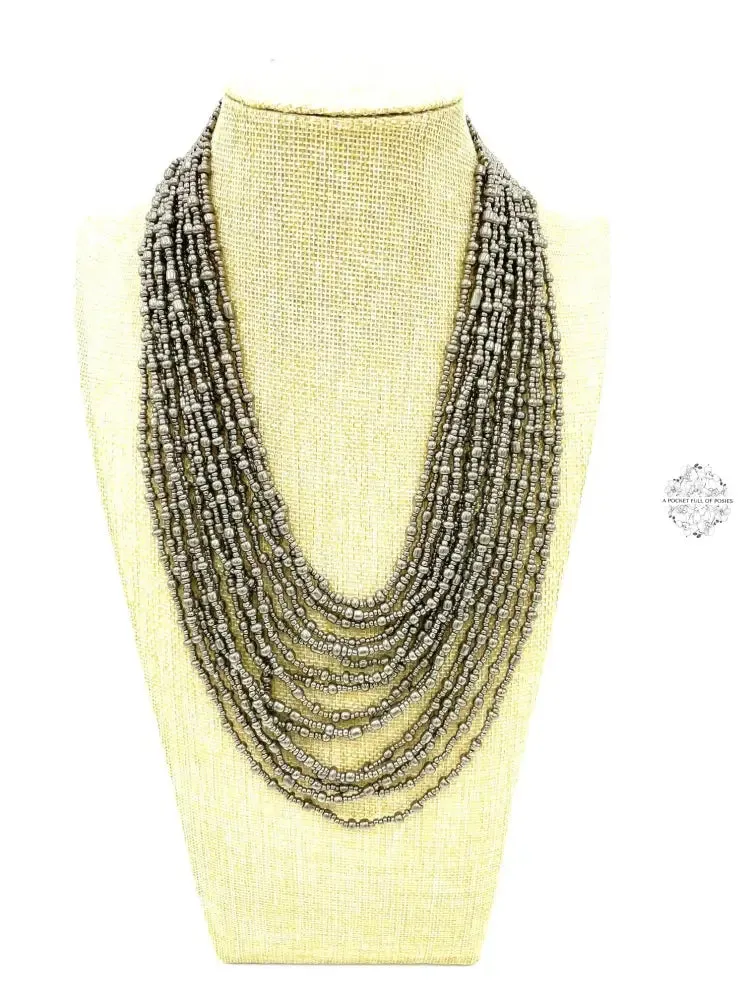 Hand beaded necklace from Ecuador | Multi-strand | Loop & Ball Closure | Eye-catching Design |