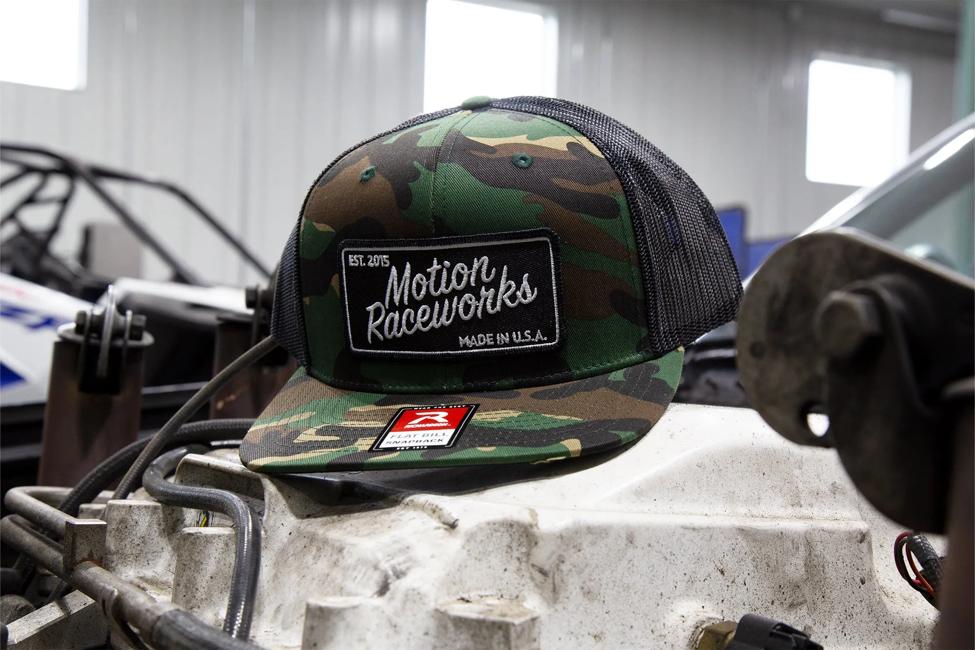 Motion Heritage Flat Bill Hat Green Camo/Black Snapback